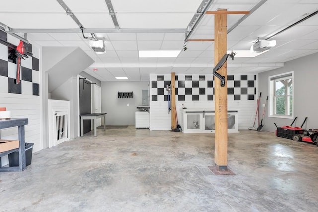 1250 Ed Seay Gregory Ln, Hartsville, TN 37074 - garage with electric panel and a garage door opener