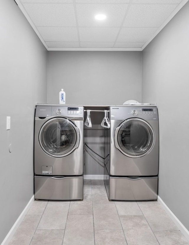 1250 Ed Seay Gregory Ln, Hartsville, TN 37074 - laundry area featuring separate washer and dryer and tile patterned flooring