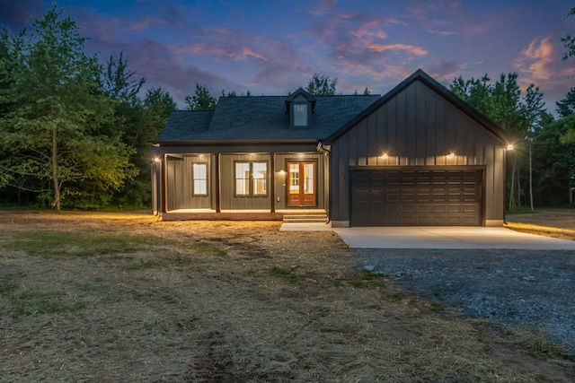 4106 Asbury Rd, Manchester, TN 37355 - modern farmhouse with driveway, french doors, board and batten siding, a garage, and roof with shingles