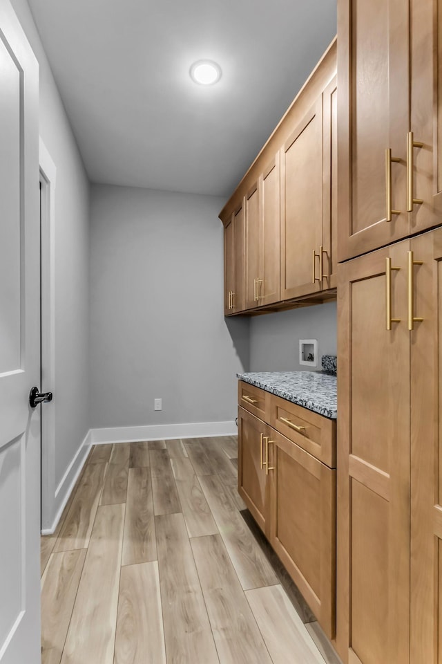 4106 Asbury Rd, Manchester, TN 37355 - washroom with cabinet space, hookup for a washing machine, light wood-type flooring, and recessed lighting