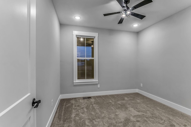 4106 Asbury Rd, Manchester, TN 37355 - spare room featuring dark carpet, ceiling fan, and recessed lighting