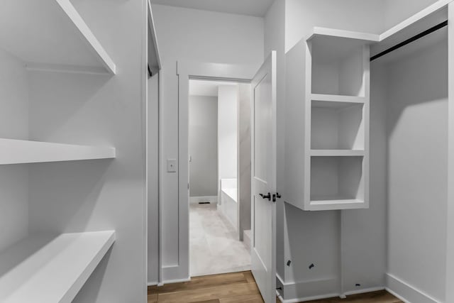 4106 Asbury Rd, Manchester, TN 37355 - spacious closet with light wood-type flooring