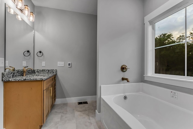 4106 Asbury Rd, Manchester, TN 37355 - bathroom featuring vanity, a bath, and tile patterned floors
