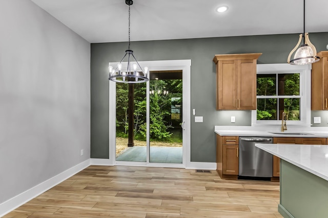 4106 Asbury Rd, Manchester, TN 37355 - kitchen featuring dishwasher, a chandelier, light countertops, light wood-type flooring, and recessed lighting