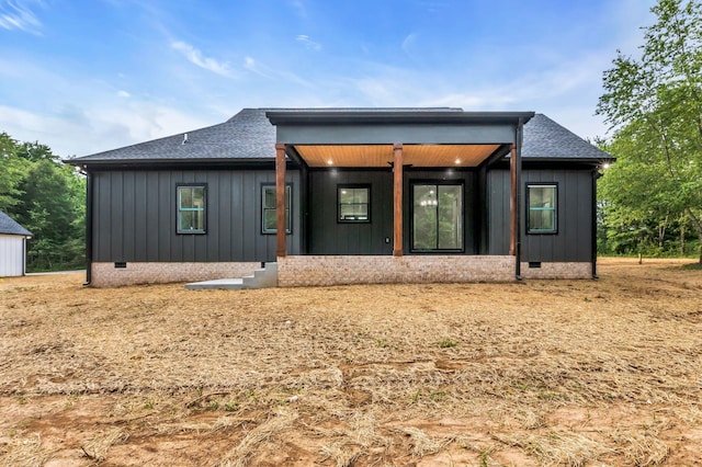 4106 Asbury Rd, Manchester, TN 37355 - view of front of house with crawl space, roof with shingles, board and batten siding, and covered porch