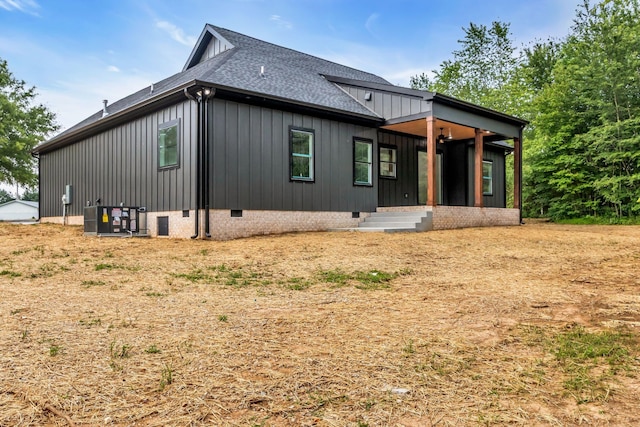 4106 Asbury Rd, Manchester, TN 37355 - back of property featuring crawl space, roof with shingles, and board and batten siding