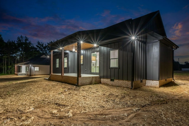 4106 Asbury Rd, Manchester, TN 37355 - view of side of property with board and batten siding and crawl space