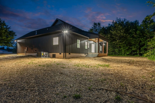 4106 Asbury Rd, Manchester, TN 37355 - view of side of property with board and batten siding and a central AC unit