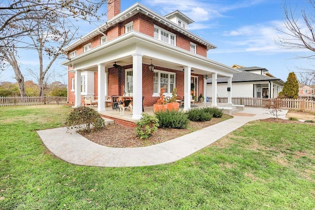 709 S Greenwood Ave S, Chattanooga, TN 37404 - rear view of house with brick siding, ceiling fan, a chimney, and a patio