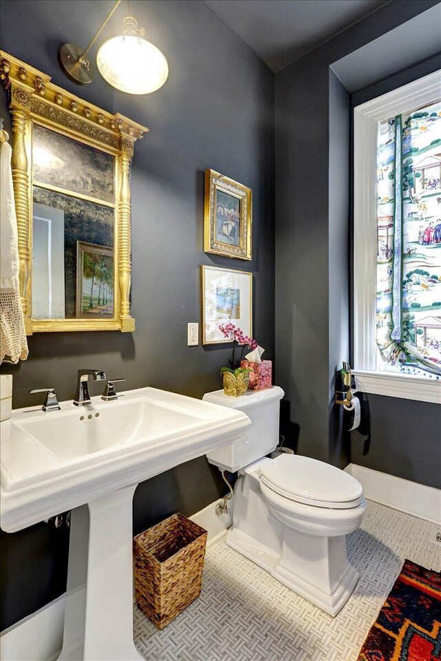 709 S Greenwood Ave S, Chattanooga, TN 37404 - half bathroom featuring toilet and tile patterned floors
