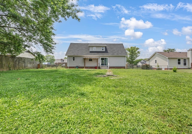 3405 Polly Dr, Clarksville, TN 37042 - back of house featuring a fenced backyard and roof with shingles