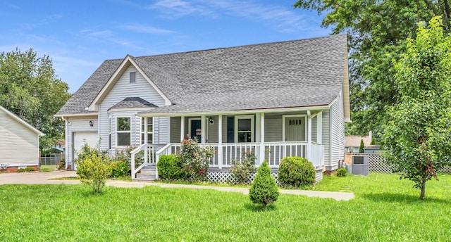 3405 Polly Dr, Clarksville, TN 37042 - view of front of property with a porch, an attached garage, roof with shingles, and a front lawn