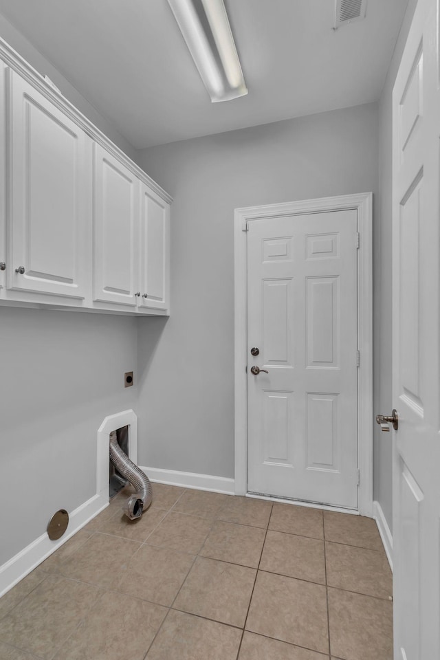 2342 N Tennessee Blvd Unit 603, Murfreesboro, TN 37130 - washroom with hookup for an electric dryer, cabinet space, and light tile patterned floors