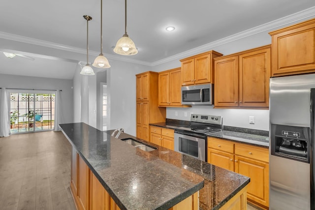 2342 N Tennessee Blvd Unit 603, Murfreesboro, TN 37130 - kitchen featuring stainless steel appliances, a kitchen island with sink, crown molding, decorative light fixtures, and dark stone counters