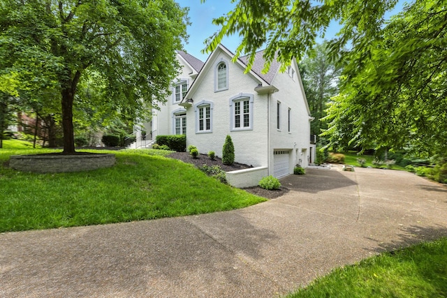 1060 Wilshire Way, Brentwood, TN 37027 - view of front of property featuring driveway, a garage, and a front yard
