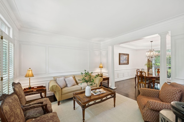 1060 Wilshire Way, Brentwood, TN 37027 - living room featuring a decorative wall, decorative columns, plenty of natural light, crown molding, and a chandelier