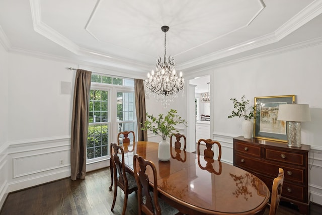 1060 Wilshire Way, Brentwood, TN 37027 - dining area featuring dark wood finished floors, a raised ceiling, a chandelier, crown molding, and a decorative wall
