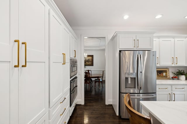 1060 Wilshire Way, Brentwood, TN 37027 - kitchen featuring stainless steel fridge, ornamental molding, white cabinets, dark wood-style flooring, and light stone counters