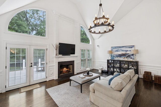 1060 Wilshire Way, Brentwood, TN 37027 - living room with a chandelier, french doors, healthy amount of natural light, high vaulted ceiling, and dark wood-style flooring