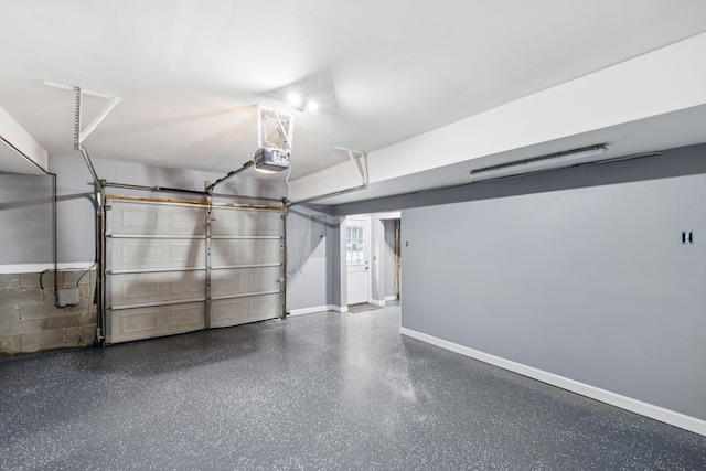 1060 Wilshire Way, Brentwood, TN 37027 - garage with a garage door opener and baseboards