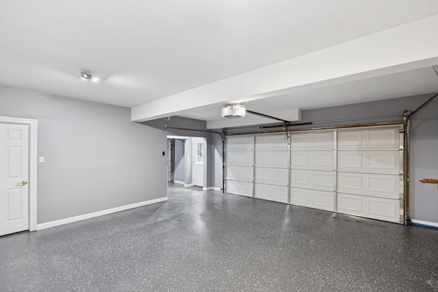 1060 Wilshire Way, Brentwood, TN 37027 - garage featuring a garage door opener and baseboards