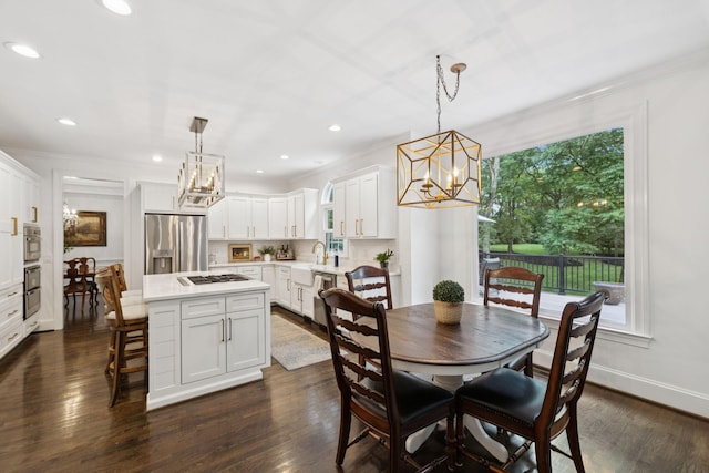 1060 Wilshire Way, Brentwood, TN 37027 - dining area with a chandelier, healthy amount of natural light, ornamental molding, dark wood-type flooring, and recessed lighting
