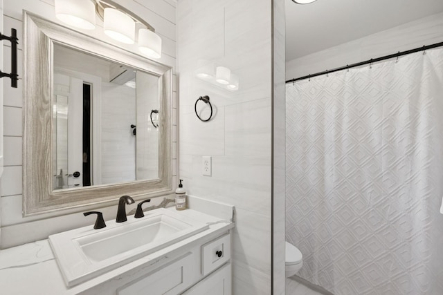 1060 Wilshire Way, Brentwood, TN 37027 - full bathroom with vanity, tile walls, and a shower with shower curtain