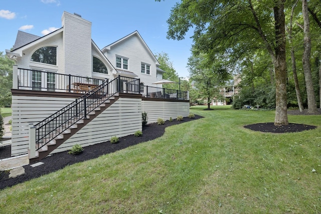 1060 Wilshire Way, Brentwood, TN 37027 - back of property with stairway, a deck, a yard, and a chimney