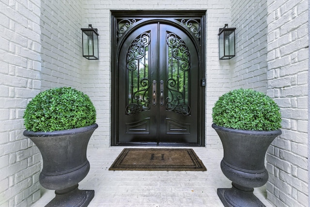 1060 Wilshire Way, Brentwood, TN 37027 - view of exterior entry with french doors and brick siding
