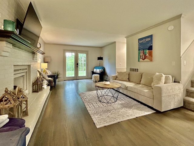 1307 Tomahawk Trce, Murfreesboro, TN 37129 - living area with wood finished floors, ornamental molding, french doors, and a fireplace