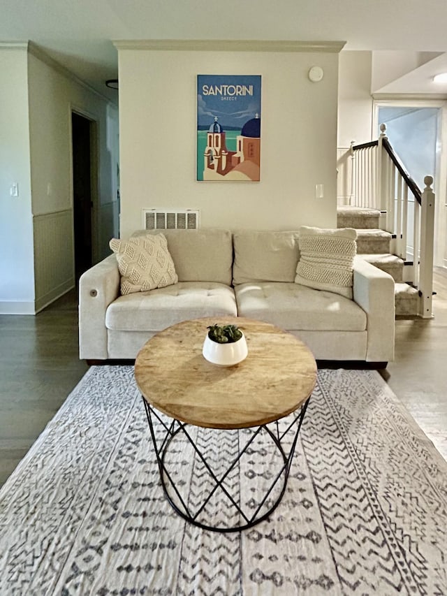 1307 Tomahawk Trce, Murfreesboro, TN 37129 - living area featuring crown molding, wood finished floors, stairs, and wainscoting