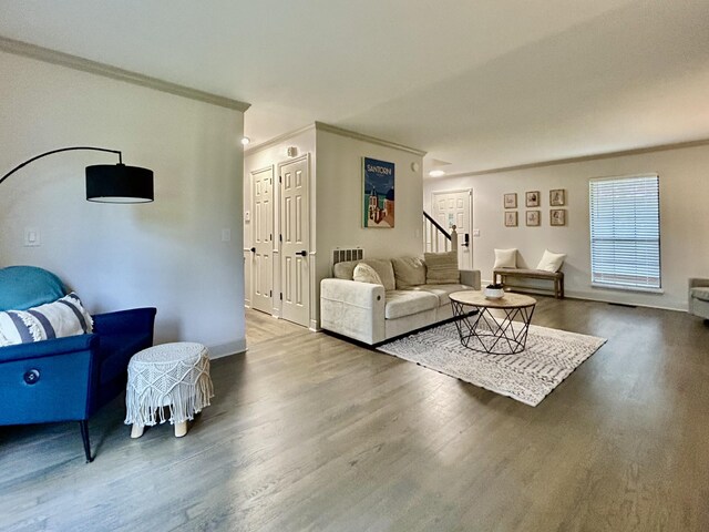 1307 Tomahawk Trce, Murfreesboro, TN 37129 - living room with wood finished floors, crown molding, and stairs