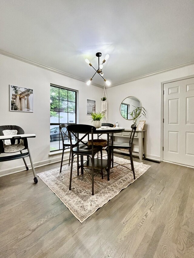 1307 Tomahawk Trce, Murfreesboro, TN 37129 - dining space featuring crown molding, wood finished floors, and a chandelier