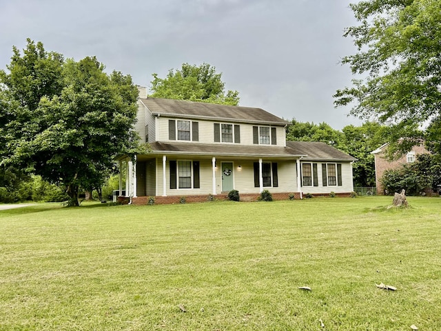 1307 Tomahawk Trce, Murfreesboro, TN 37129 - view of front facade with covered porch, a front yard, and a chimney