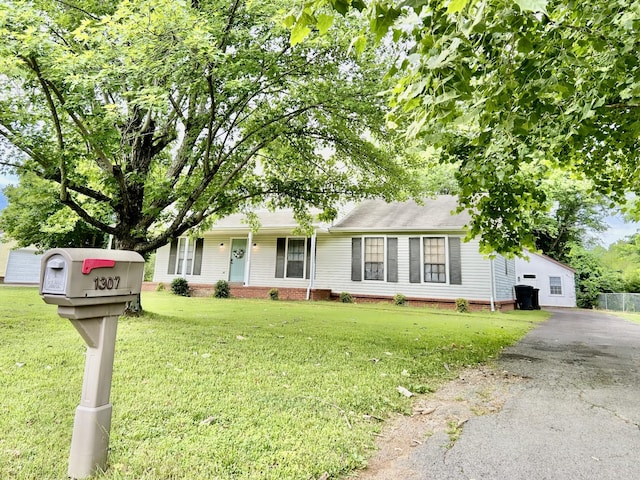 1307 Tomahawk Trce, Murfreesboro, TN 37129 - single story home with a front lawn, driveway, and a shingled roof