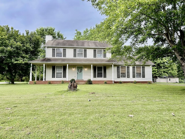 1307 Tomahawk Trce, Murfreesboro, TN 37129 - view of front of house featuring a chimney, a front yard, and covered porch