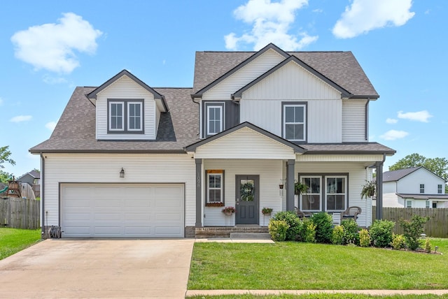 1098 Eagles View Dr, Clarksville, TN 37040 - view of front of property with concrete driveway, roof with shingles, and a porch