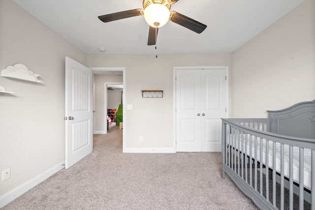 1098 Eagles View Dr, Clarksville, TN 37040 - bedroom with a closet, carpet floors, a ceiling fan, and a crib
