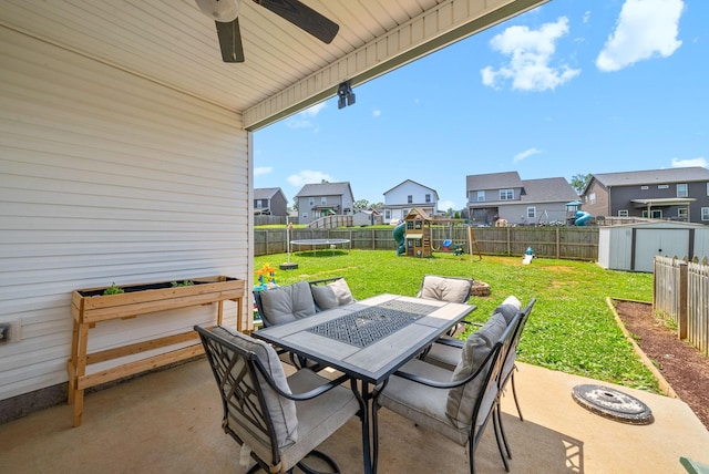 1098 Eagles View Dr, Clarksville, TN 37040 - fenced backyard with a trampoline, a residential view, a patio, a playground, and outdoor dining area