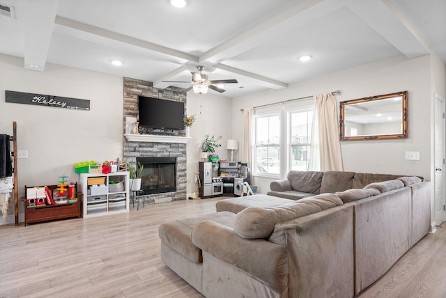 1098 Eagles View Dr, Clarksville, TN 37040 - living room featuring a stone fireplace, beamed ceiling, light wood-style flooring, ceiling fan, and recessed lighting