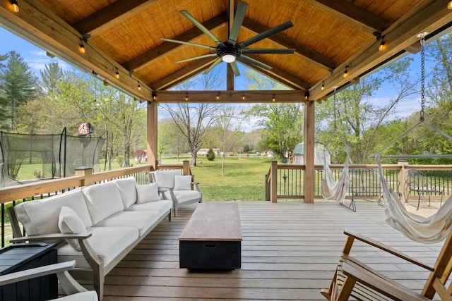 2913 New Hope Rd, Hendersonville, TN 37075 - deck with an outdoor living space, a yard, ceiling fan, and a gazebo