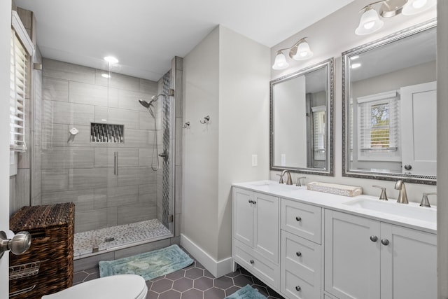 2913 New Hope Rd, Hendersonville, TN 37075 - bathroom featuring a stall shower, tile patterned flooring, double vanity, and recessed lighting