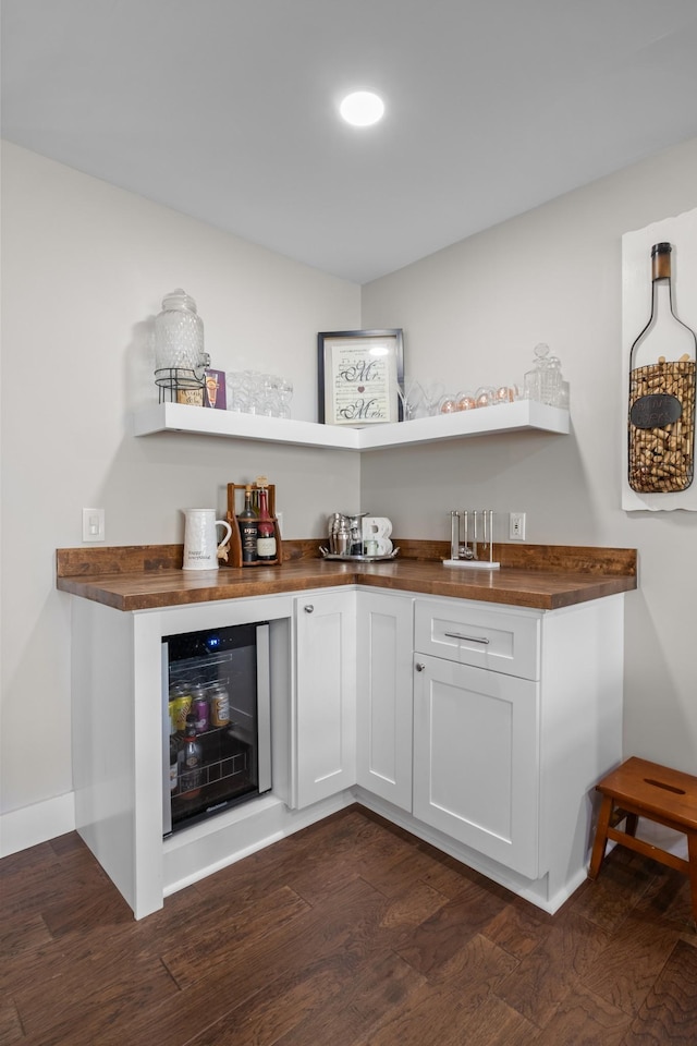2913 New Hope Rd, Hendersonville, TN 37075 - indoor dry bar featuring wine cooler and dark wood-style flooring