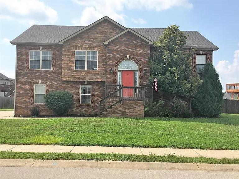 1164 Chinook Cir, Clarksville, TN 37042 - view of front of house featuring a front lawn and brick siding