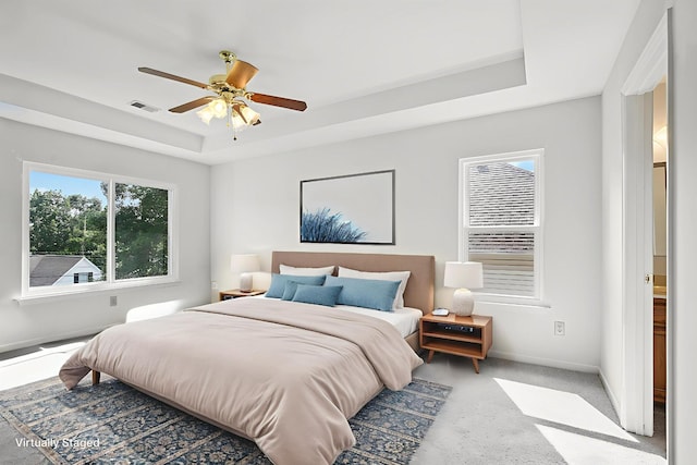 1438 Brighton Cir, Old Hickory, TN 37138 - bedroom with a raised ceiling, light carpet, and a ceiling fan