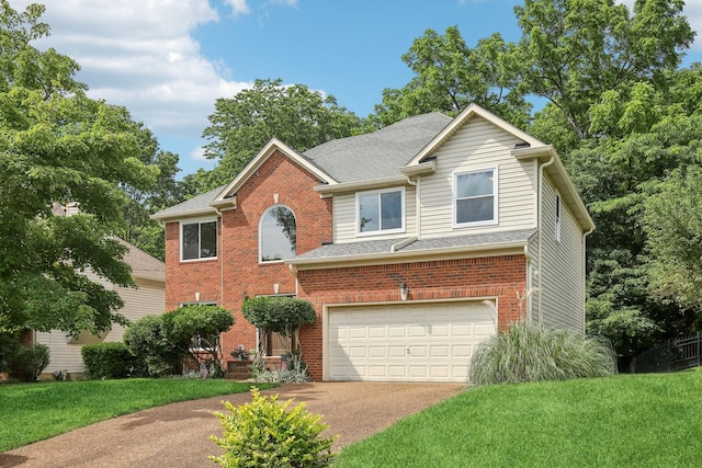 1438 Brighton Cir, Old Hickory, TN 37138 - traditional home with asphalt driveway, a front lawn, an attached garage, and brick siding