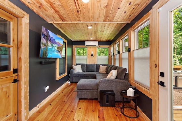 145 W Hollis Chapel Rd, Portland, TN 37148 - living area with wooden ceiling, a wall mounted air conditioner, wood-type flooring, healthy amount of natural light, and recessed lighting