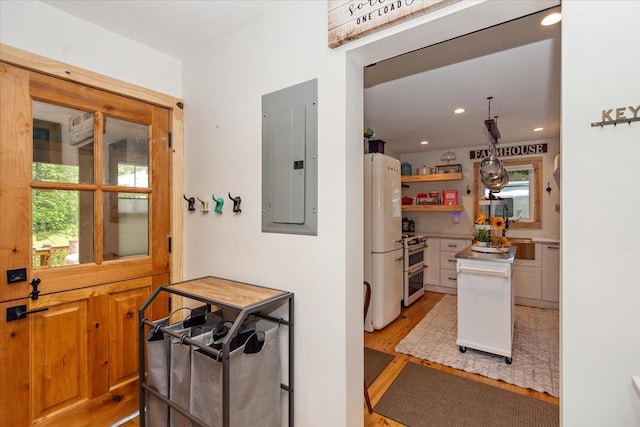 145 W Hollis Chapel Rd, Portland, TN 37148 - kitchen featuring electric panel, freestanding refrigerator, double oven range, healthy amount of natural light, and recessed lighting