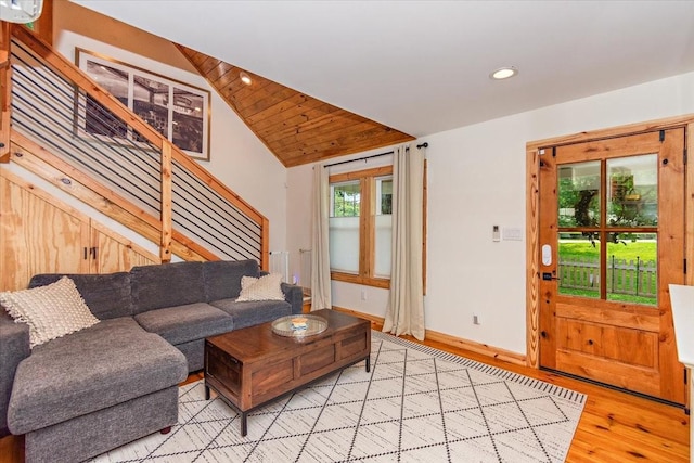 145 W Hollis Chapel Rd, Portland, TN 37148 - living room with stairway, light wood finished floors, vaulted ceiling, and recessed lighting