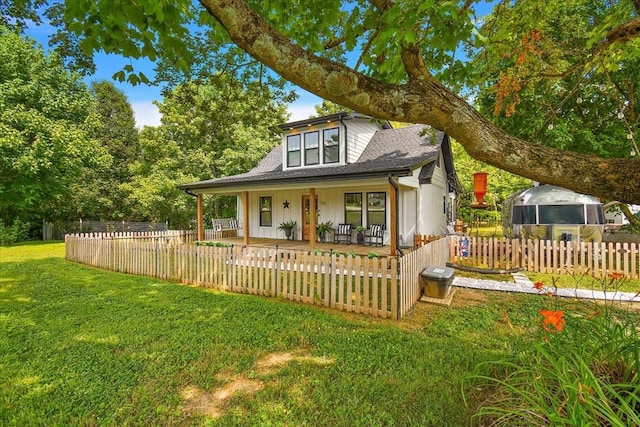 145 W Hollis Chapel Rd, Portland, TN 37148 - bungalow with a porch, roof with shingles, and a fenced front yard